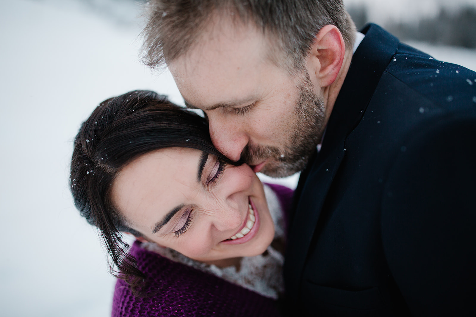 bride and groom on Lake Antorno winter elopement