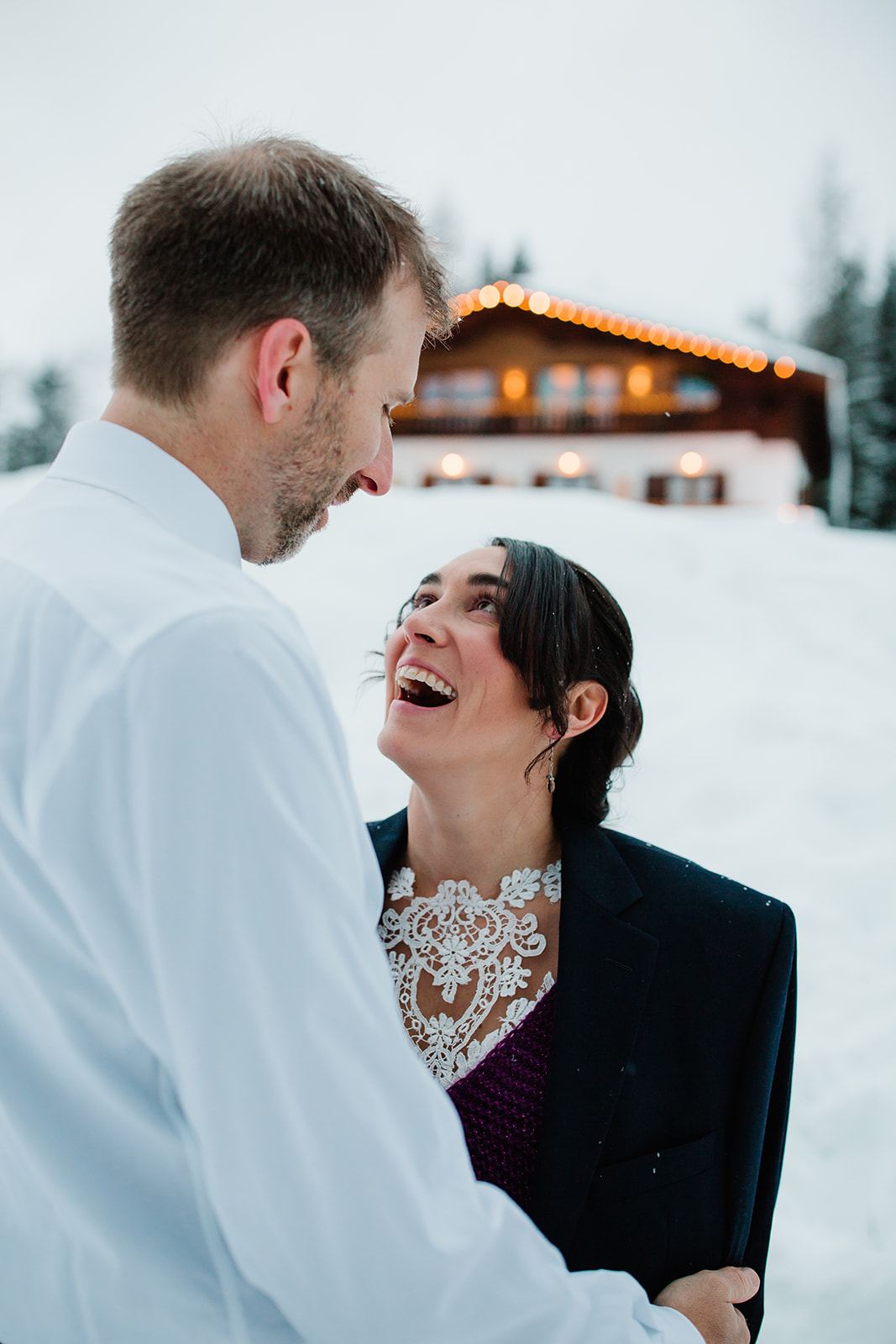 bride and groom on Lake Antorno winter elopement