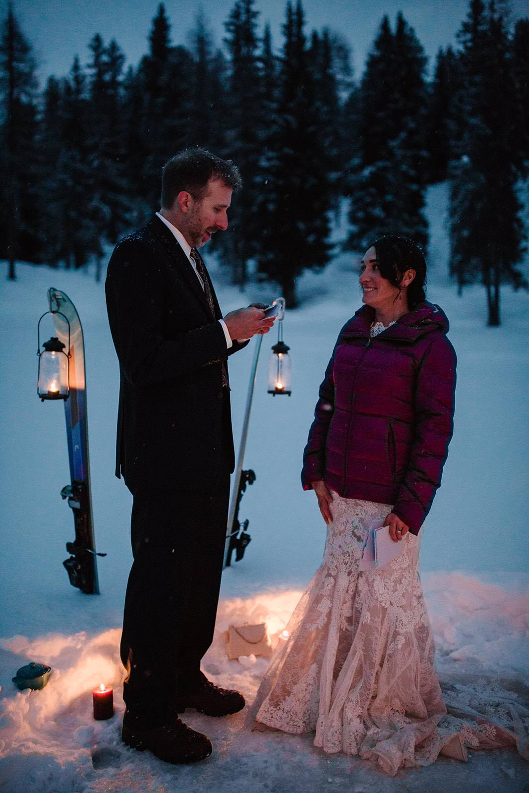 a couple on Lake Antorno candlelight winter elopement
