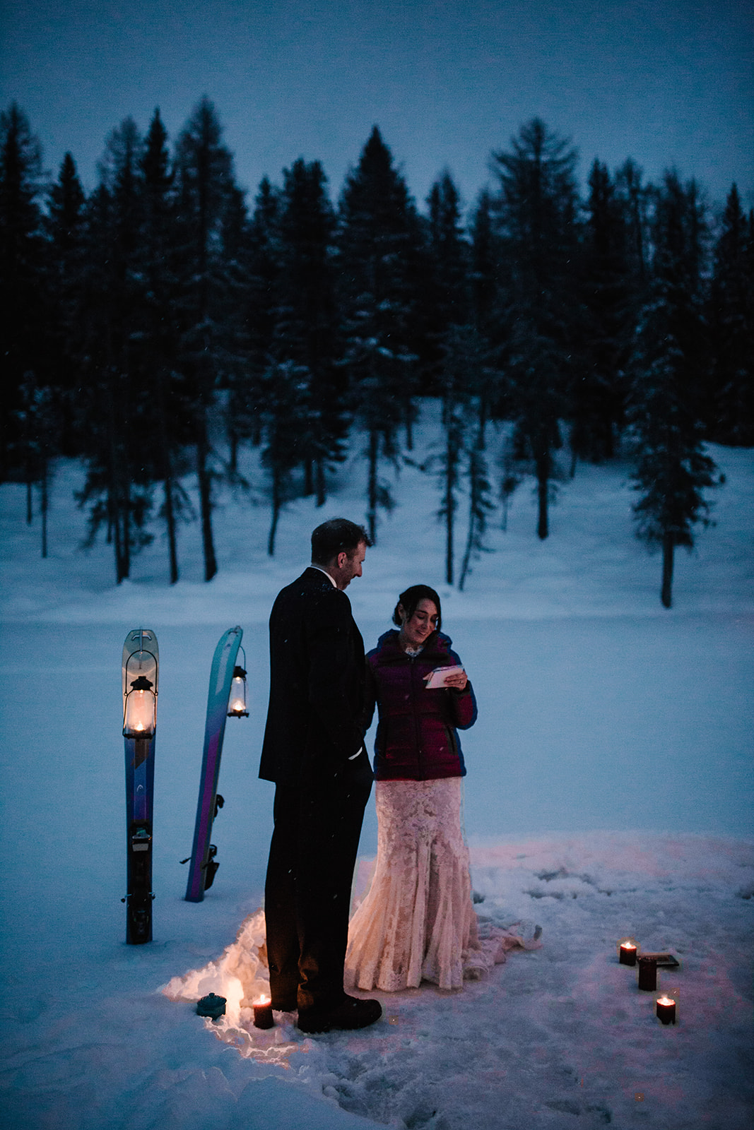 a couple on Lake Antorno candlelight winter elopement