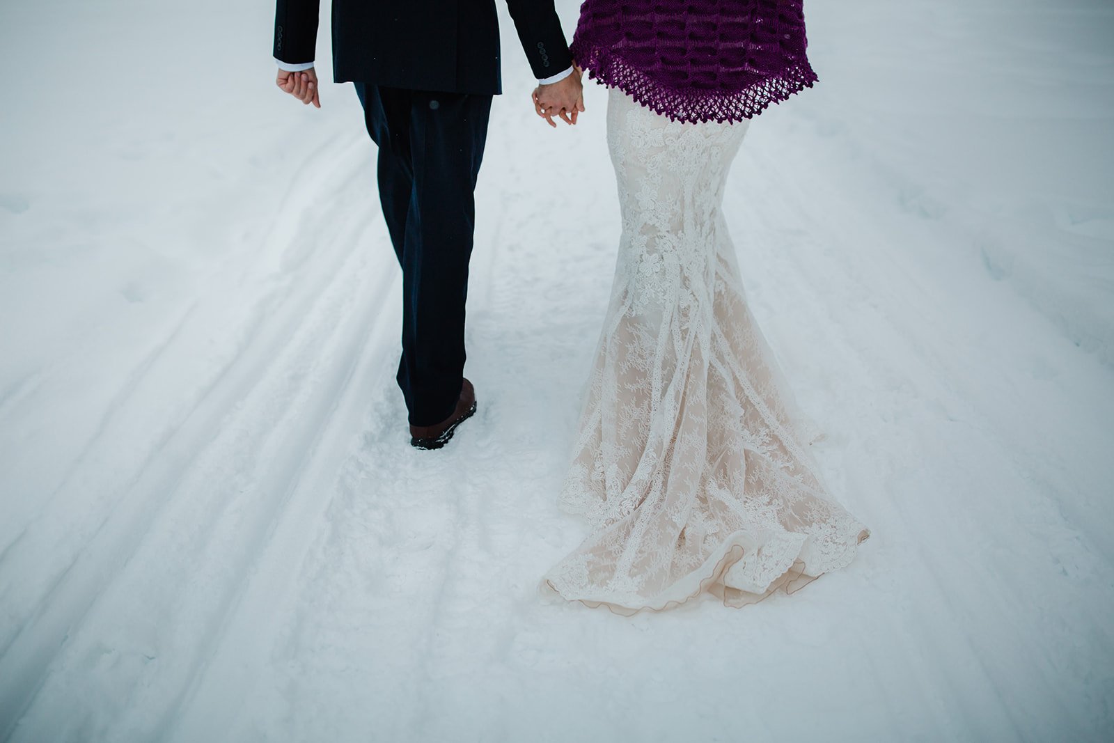 a couple on Lake Antorno winter elopement