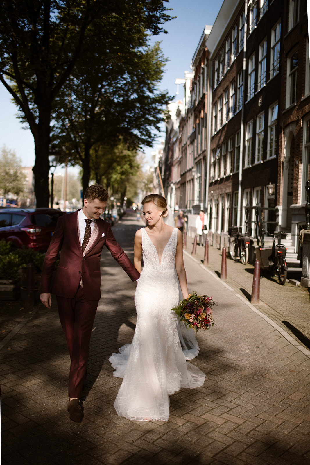 a couple getting married in the big city of Amsterdam and had a loveshoot near the canals.