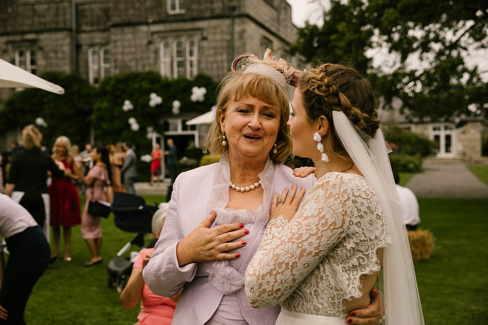 bride and mother embrace