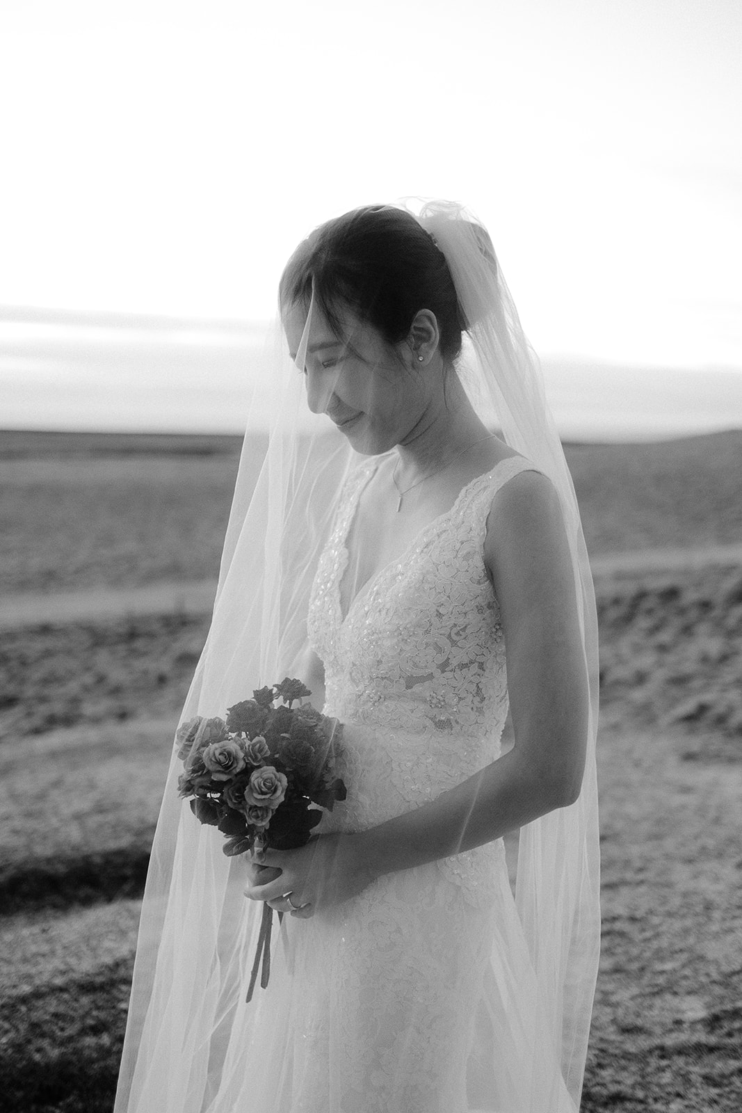 stunning black and white portrait of an Asian bride in Iceland