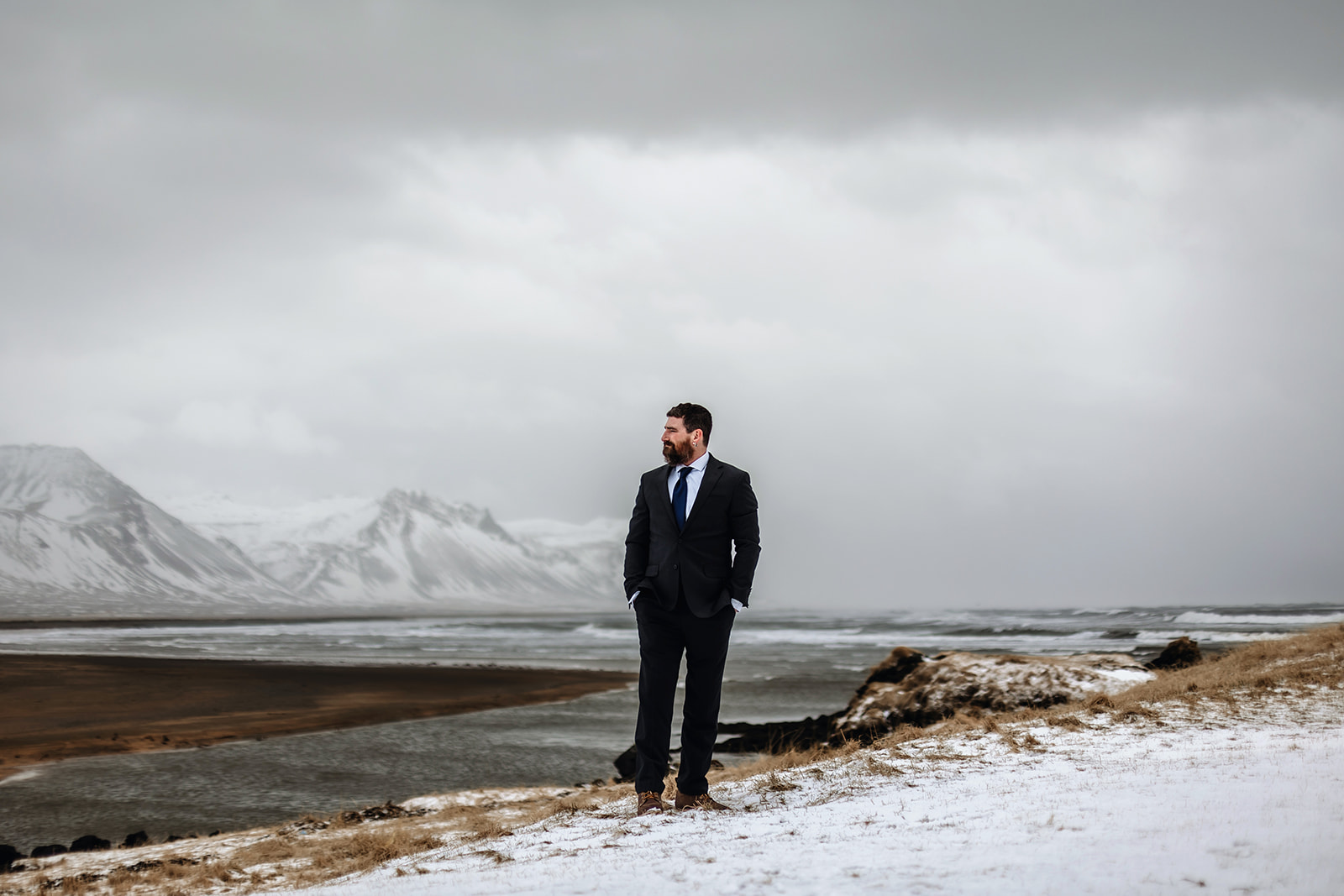 Groom portrait in March in the snow in Iceland