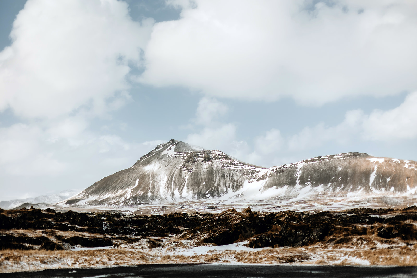 snowy landscape with mountain in Iceland