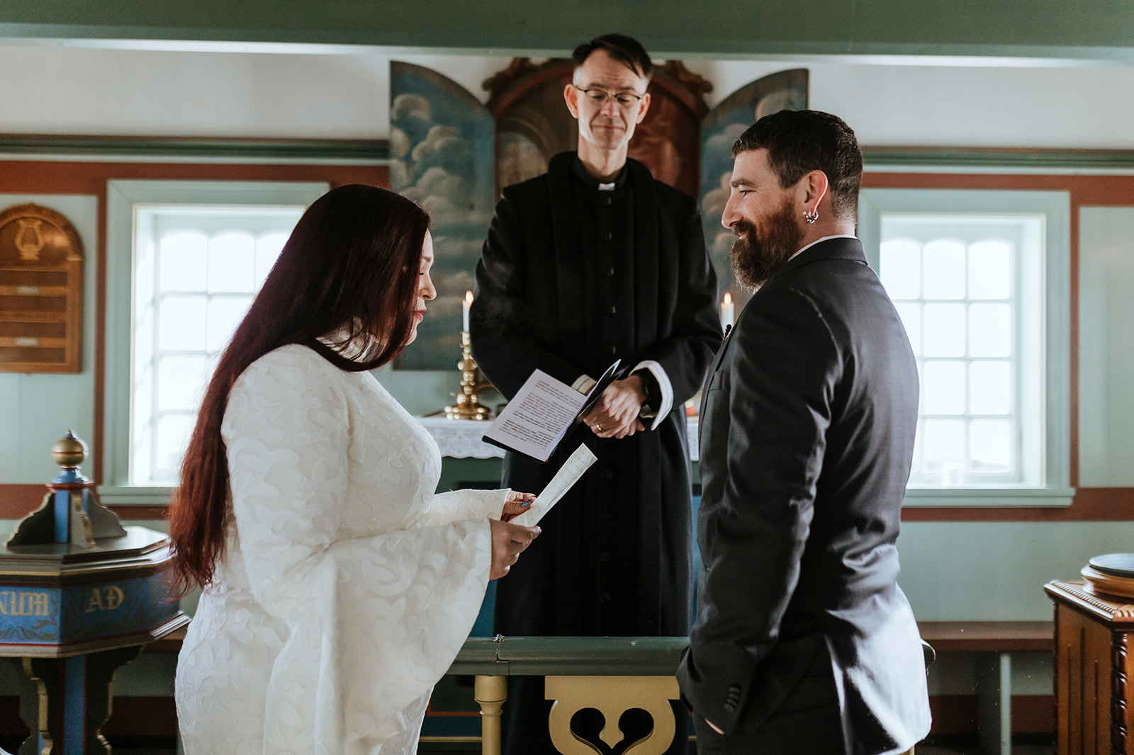 Wedding ceremony in the blackk church in Iceland, Búðdakirkja wedding ceremony