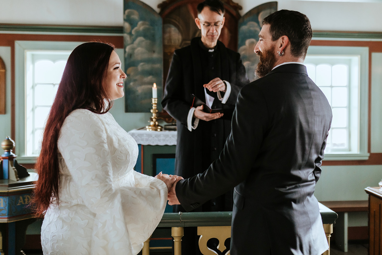 Wedding ceremony in the blackk church in Iceland, Búðdakirkja wedding ceremony