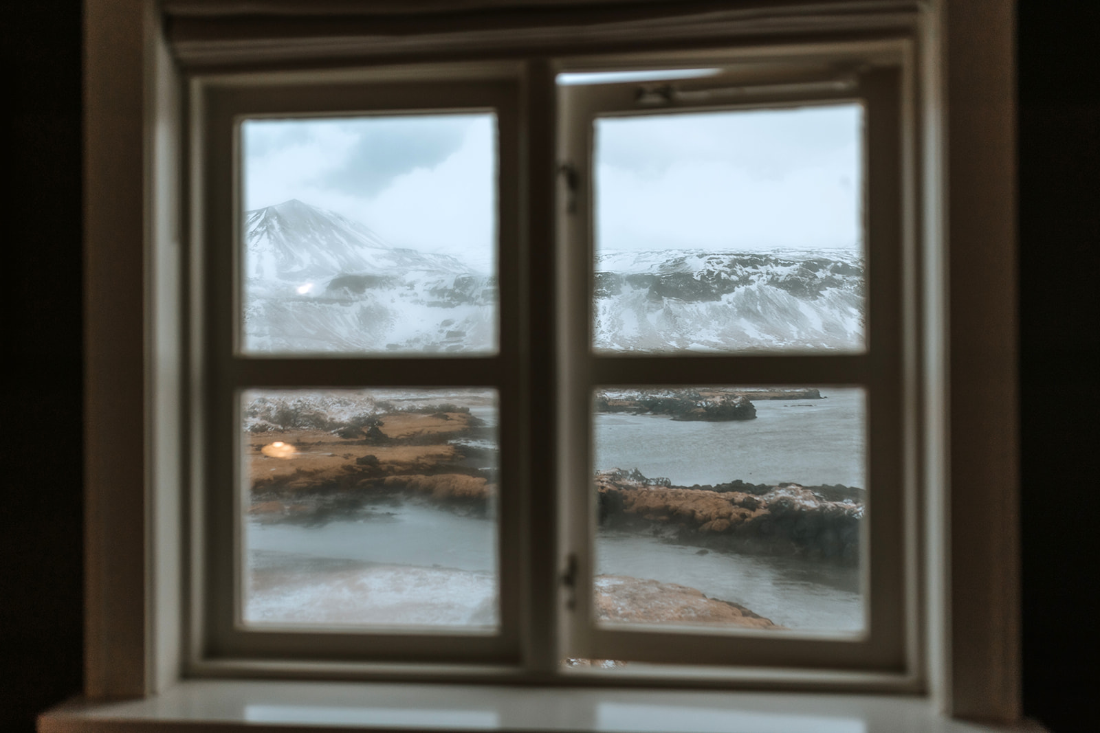 Window view of the Iceland snowy winter landscape