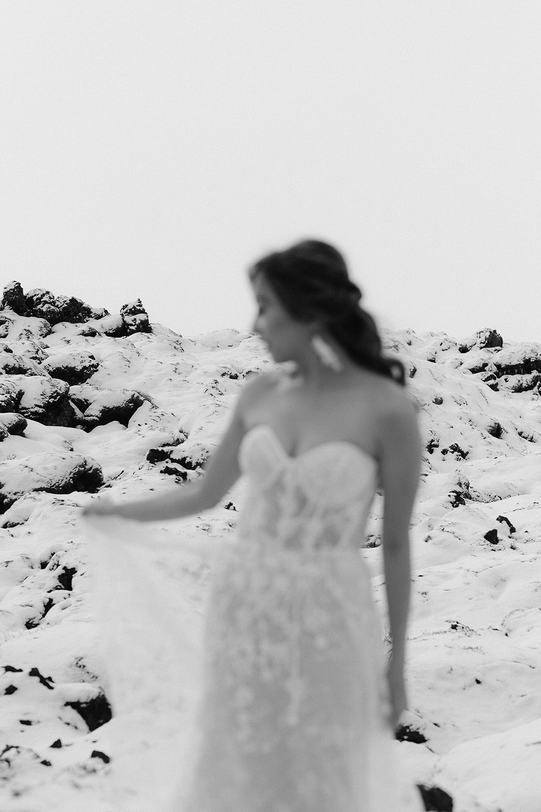Pre-wedding portrait in black and white of a bride in Iceland
