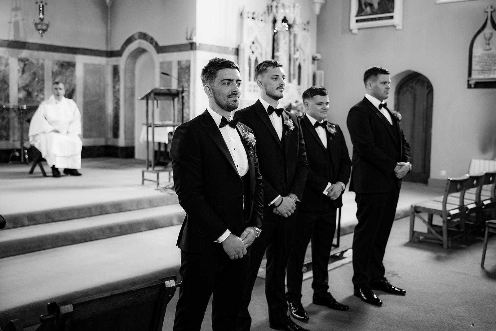 Groom and grooms men waiting for the bride to arrive
