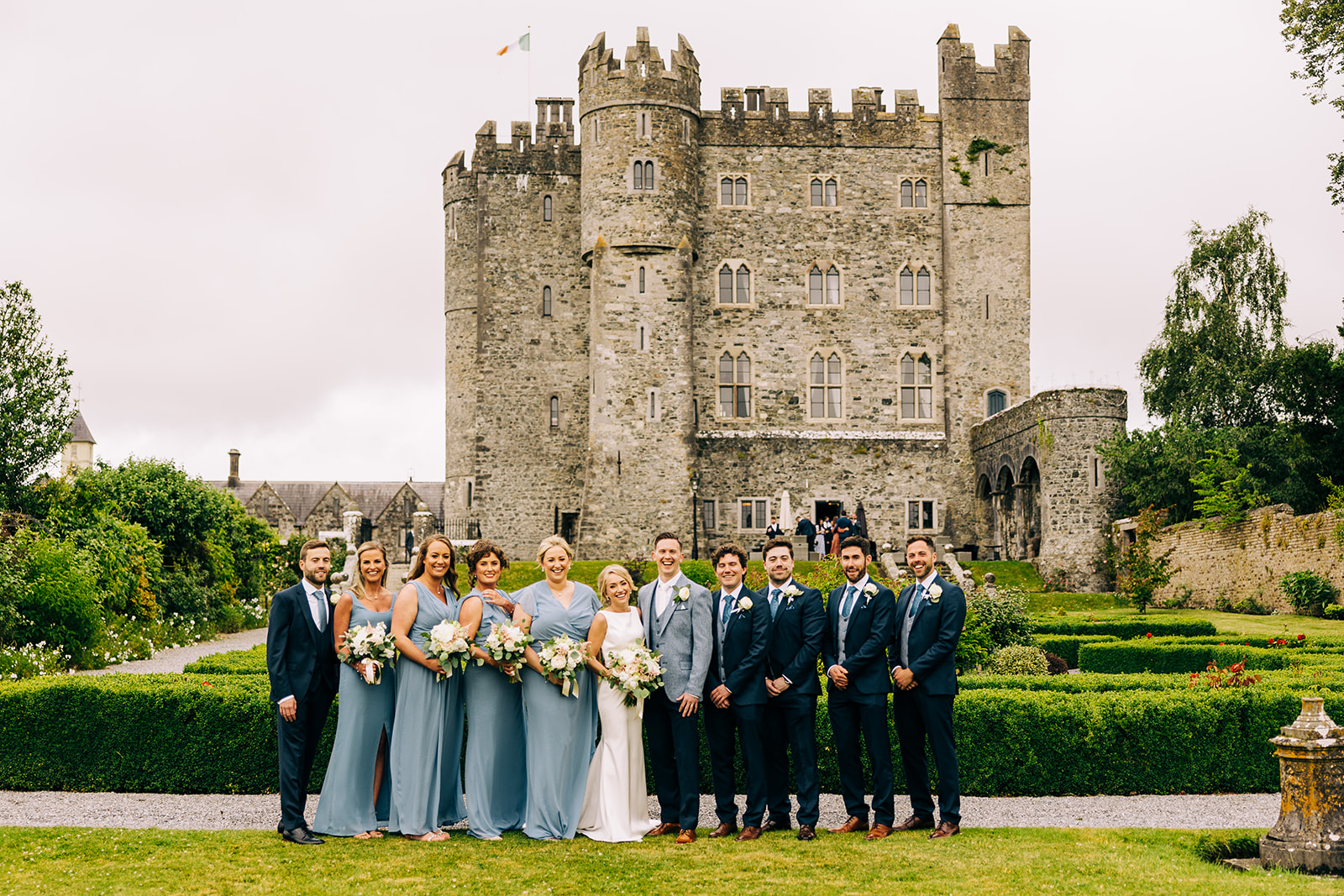 Wedding bridal party with Kilkea Castle in the background