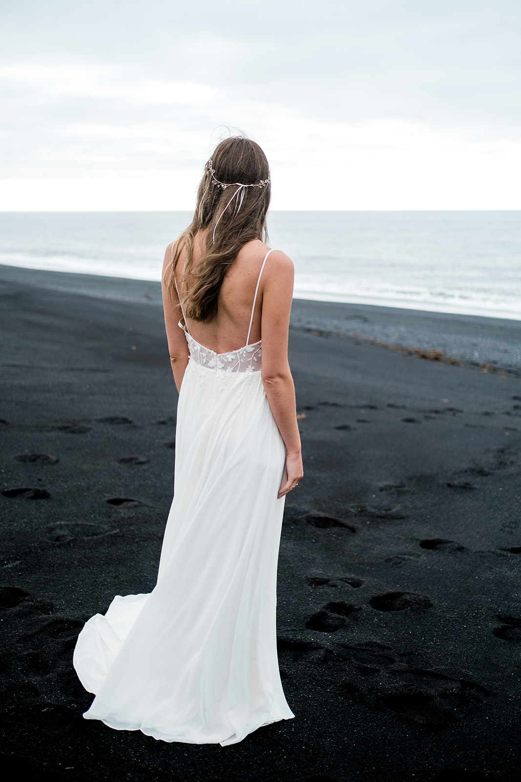 beautiful bride on a black sand beach in Iceland