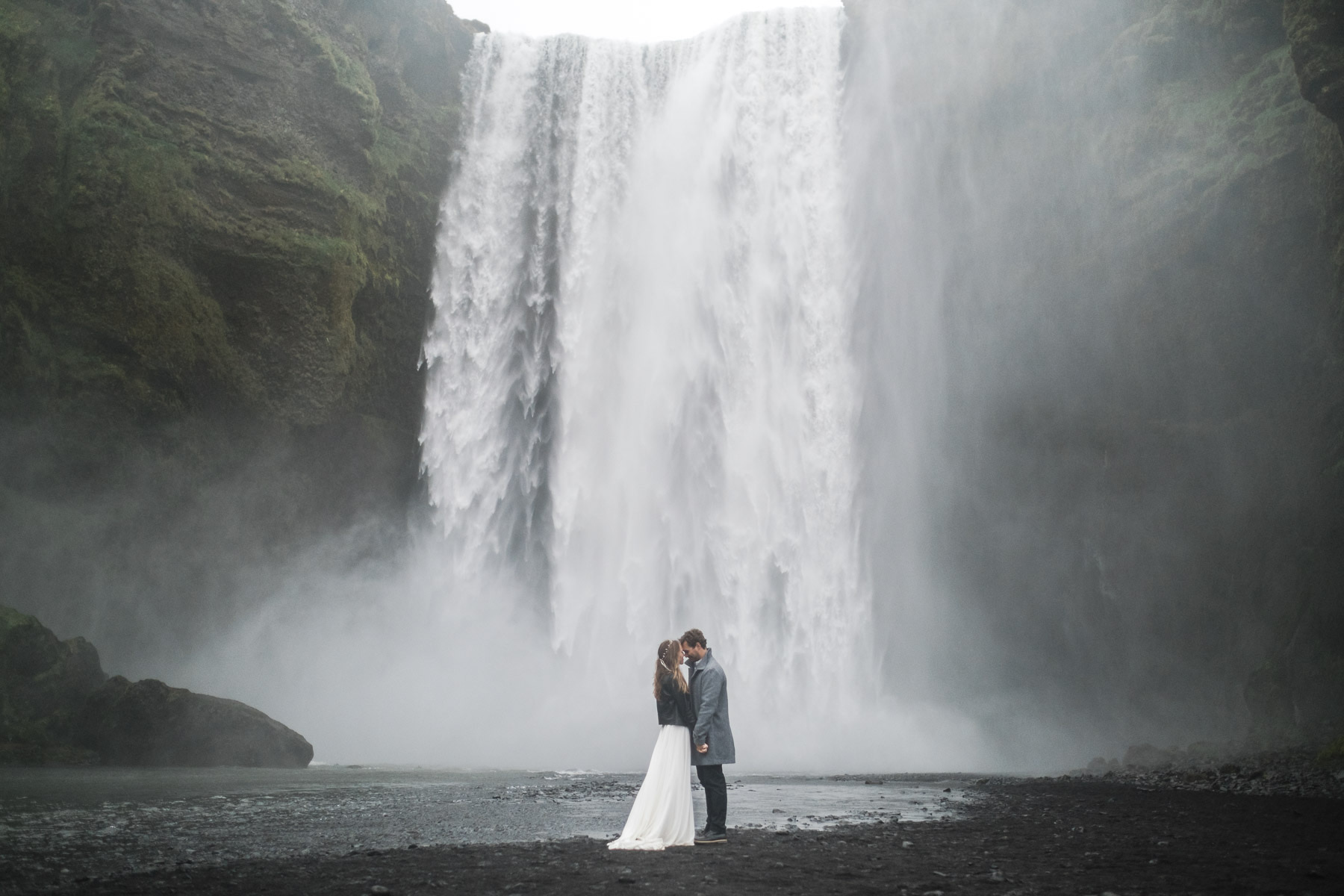 Dreamy Iceland South Coast adventure elopement at Skogafoss waterfall in Iceland