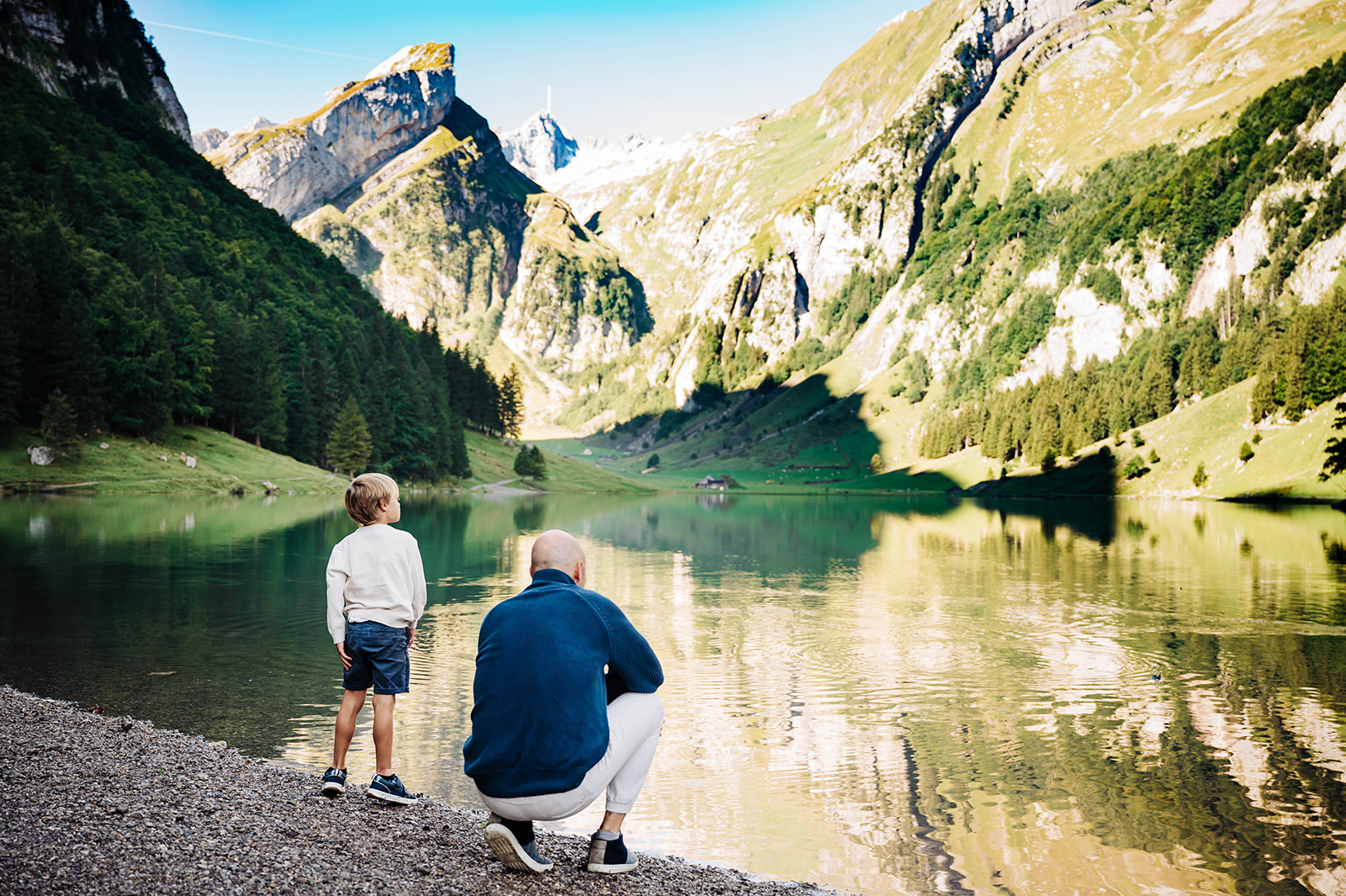 The lake reflects a father and sons love at Seealpsee Switzerland